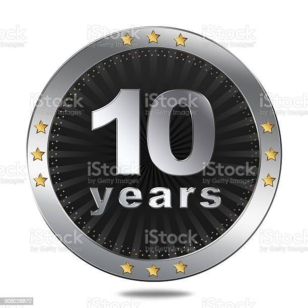 10 years anniversary silver button with gold stars.